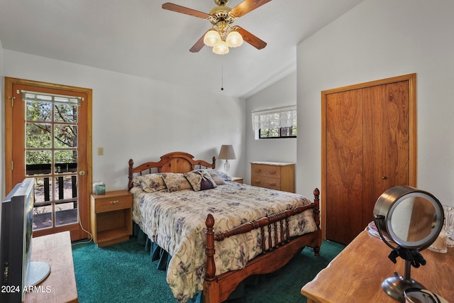 bedroom with dark colored carpet, ceiling fan, and lofted ceiling