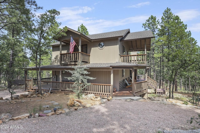 view of front of house featuring a balcony