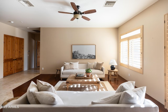 living room featuring ceiling fan