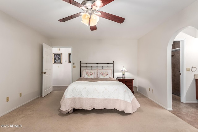 bedroom with light carpet and ceiling fan