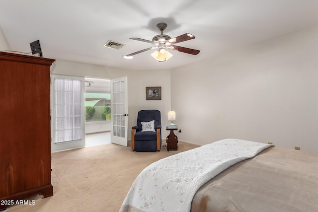 carpeted bedroom featuring ceiling fan and french doors