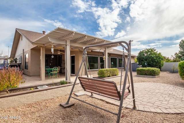 back of house featuring a pergola and a patio area