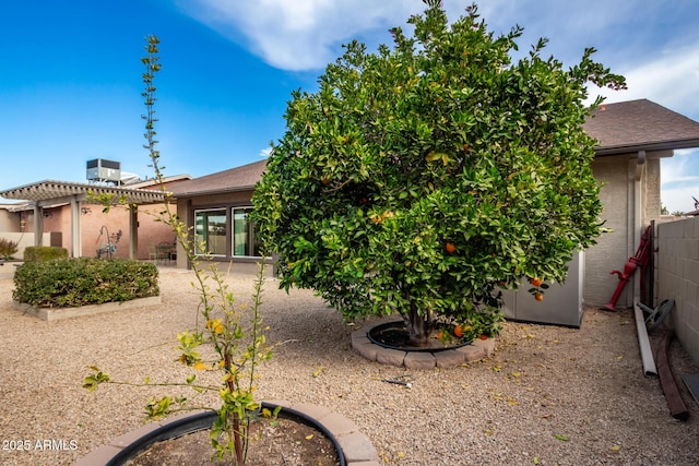 rear view of property featuring a patio area