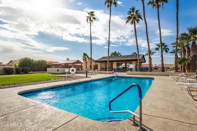 view of pool featuring a patio area