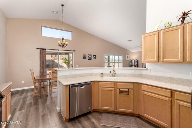 kitchen with sink, hanging light fixtures, dark hardwood / wood-style floors, dishwasher, and kitchen peninsula