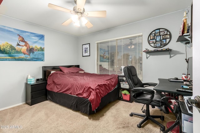 bedroom featuring light carpet and ceiling fan