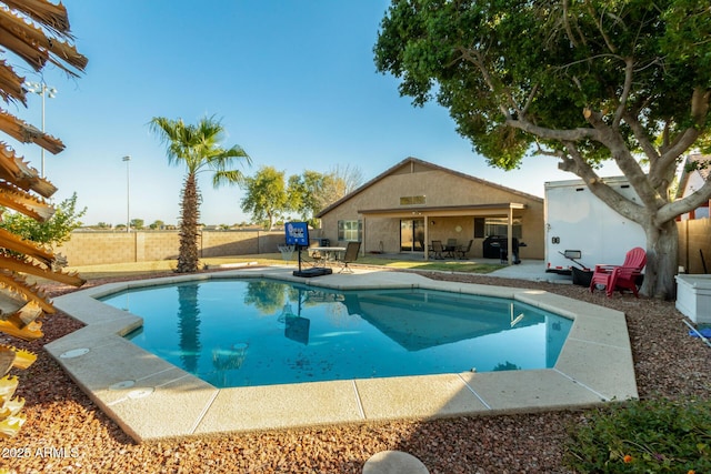 view of pool featuring a patio area