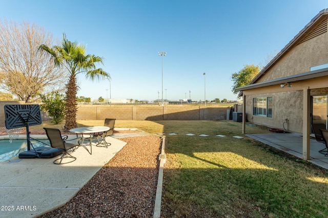 view of yard with a patio and cooling unit