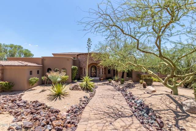 view of adobe home