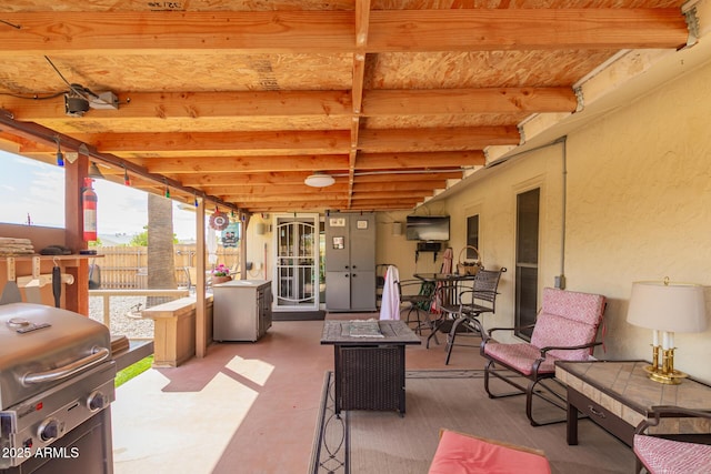 view of patio / terrace with fence and grilling area