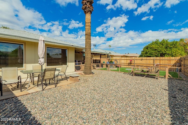 view of yard with a patio area and a fenced backyard