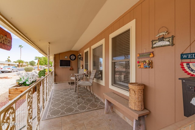 view of patio featuring a porch