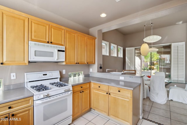 kitchen with recessed lighting, light countertops, light tile patterned floors, white appliances, and a peninsula