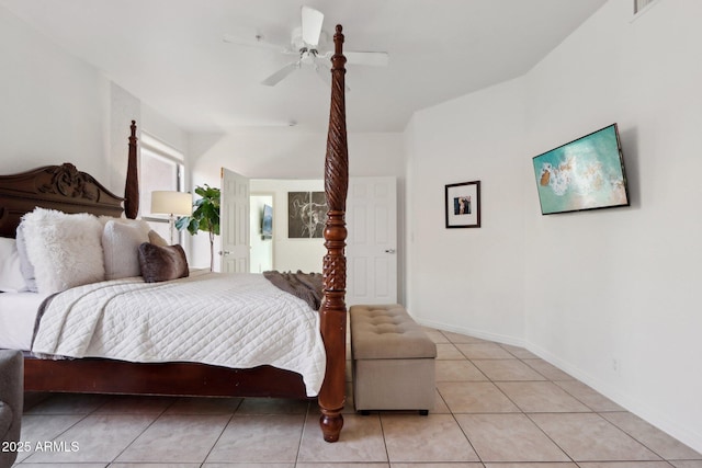 bedroom with ceiling fan, baseboards, visible vents, and light tile patterned floors