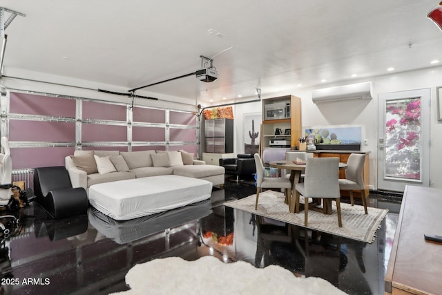 interior space featuring a garage, recessed lighting, and a wall mounted air conditioner