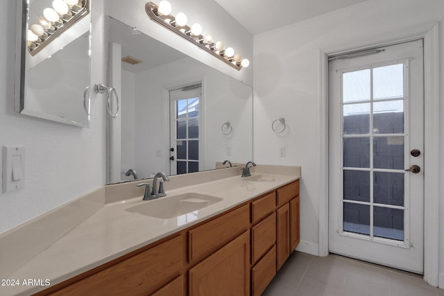 bathroom featuring vanity and tile patterned floors