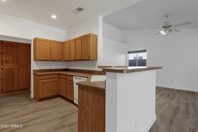 kitchen with sink, light hardwood / wood-style flooring, kitchen peninsula, and dishwasher