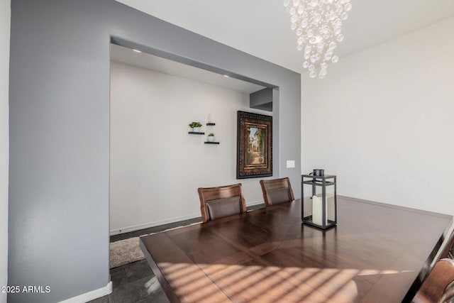 dining space with a notable chandelier