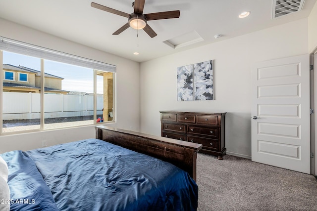 bedroom featuring light colored carpet and ceiling fan