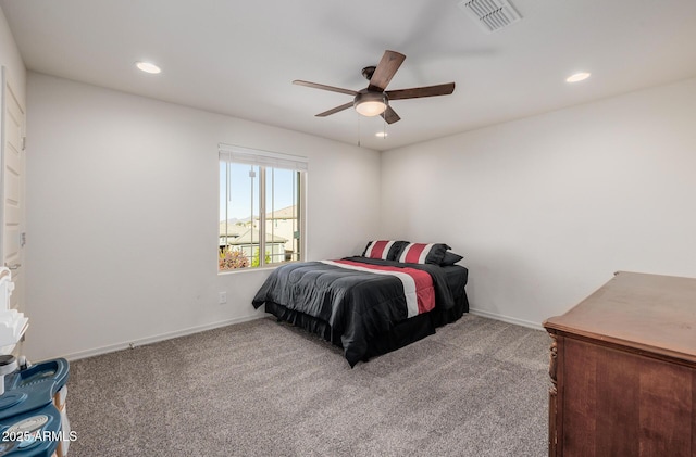 bedroom with ceiling fan and carpet floors