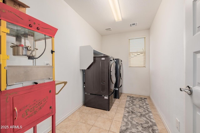 washroom with washer and clothes dryer