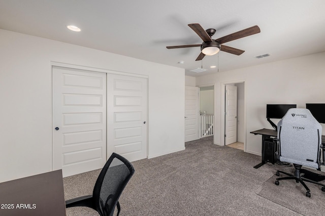 office featuring carpet flooring and ceiling fan