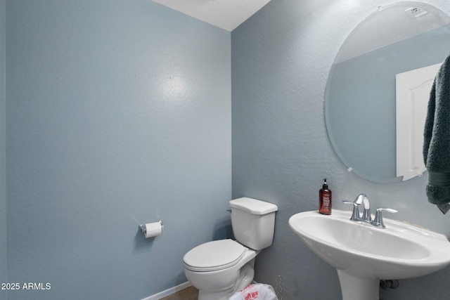 2185 E Gillcrest Rd, Gilbert, AZ 85298 - half bath featuring toilet and a sink