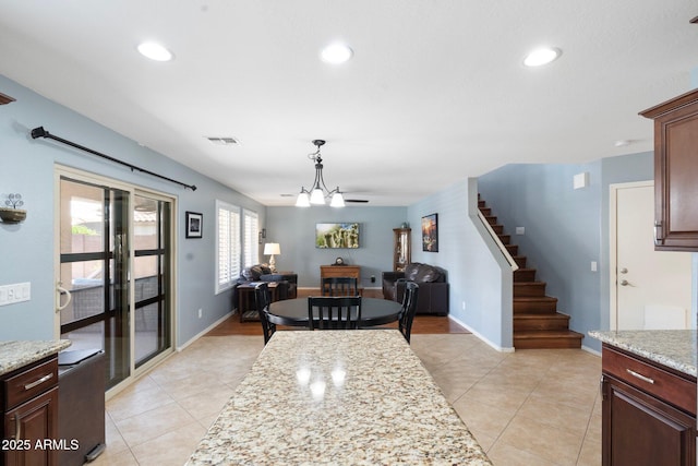 2185 E Gillcrest Rd, Gilbert, AZ 85298 - dining room featuring stairs, a chandelier, light tile patterned flooring, recessed lighting, and baseboards