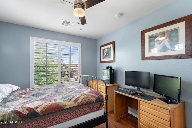 2185 E Gillcrest Rd, Gilbert, AZ 85298 - bedroom featuring wood finished floors, an office area, and a ceiling fan