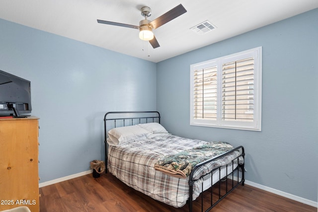 2185 E Gillcrest Rd, Gilbert, AZ 85298 - bedroom featuring wood finished floors, baseboards, and a ceiling fan