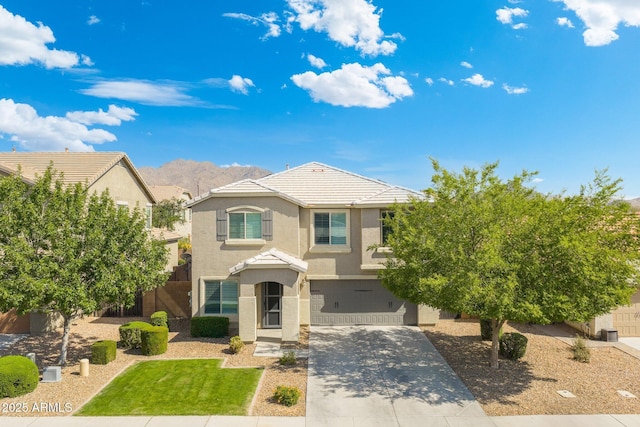 2185 E Gillcrest Rd, Gilbert, AZ 85298 - traditional-style home featuring stucco siding, an attached garage, concrete driveway, and a tiled roof
