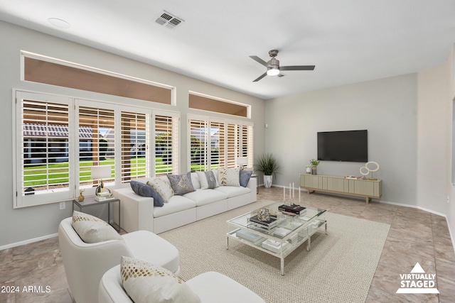 living room featuring ceiling fan