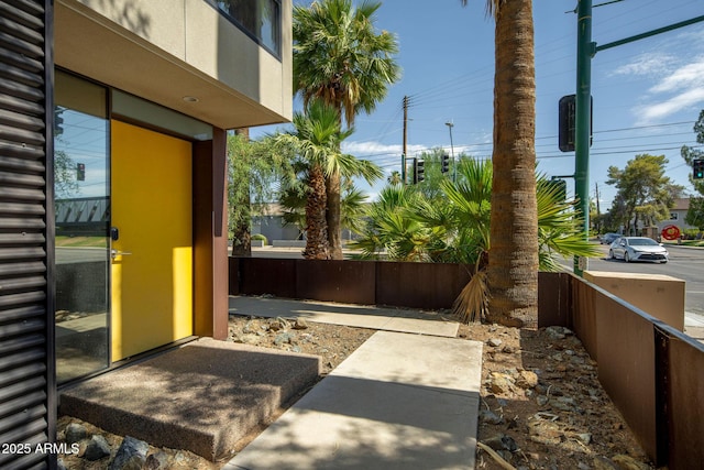 view of patio featuring fence