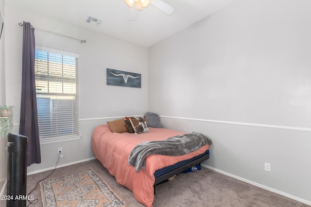 carpeted bedroom featuring ceiling fan