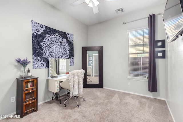 home office featuring carpet and ceiling fan