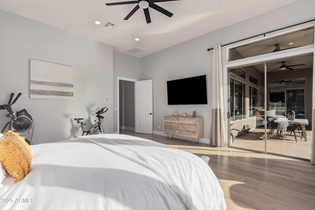 bedroom with hardwood / wood-style flooring and ceiling fan