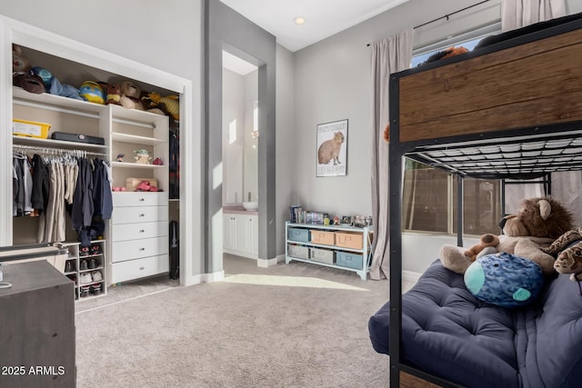 carpeted bedroom featuring a closet