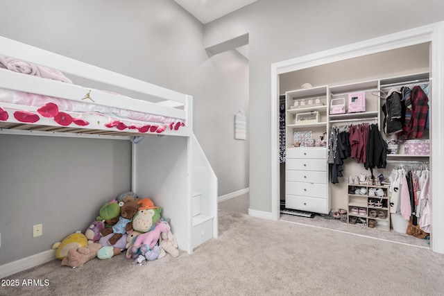 unfurnished bedroom featuring a closet and light carpet