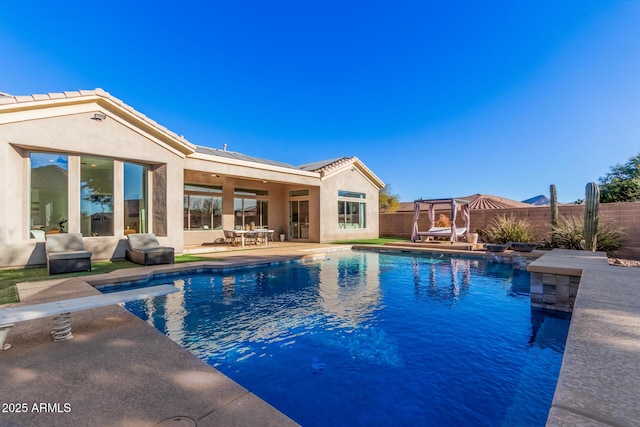 view of swimming pool featuring a patio