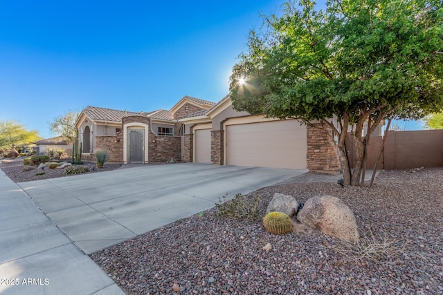 view of front of property featuring a garage