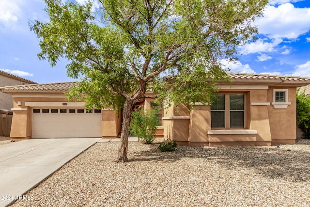 view of front of property with a garage