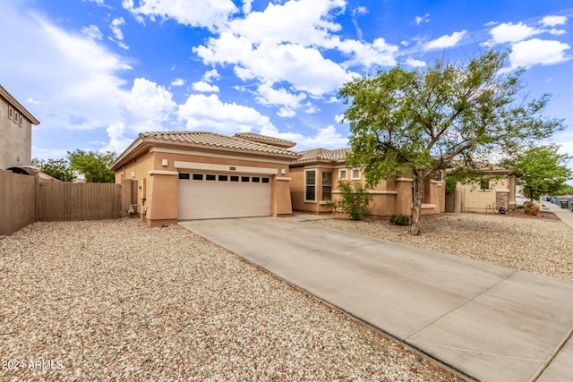 view of front of property featuring a garage