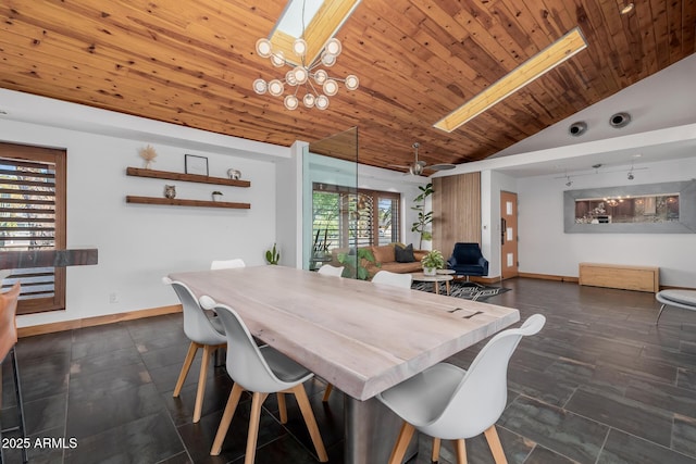 dining area with wooden ceiling, a skylight, baseboards, and high vaulted ceiling