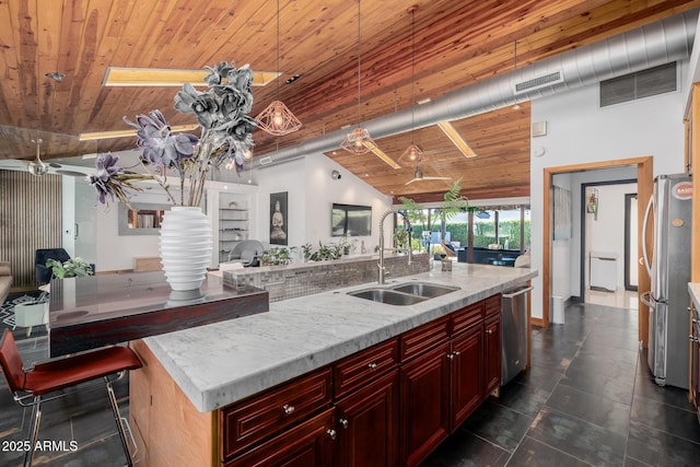 kitchen with a sink, wood ceiling, visible vents, dark brown cabinets, and appliances with stainless steel finishes