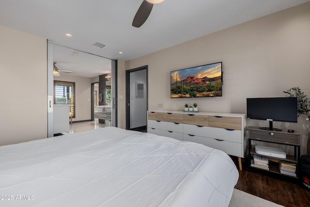 bedroom featuring ceiling fan, wood finished floors, visible vents, and recessed lighting