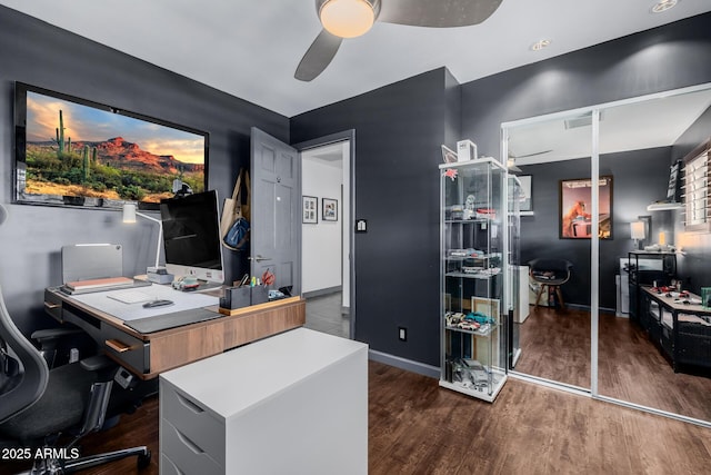 office with ceiling fan, wood finished floors, and baseboards