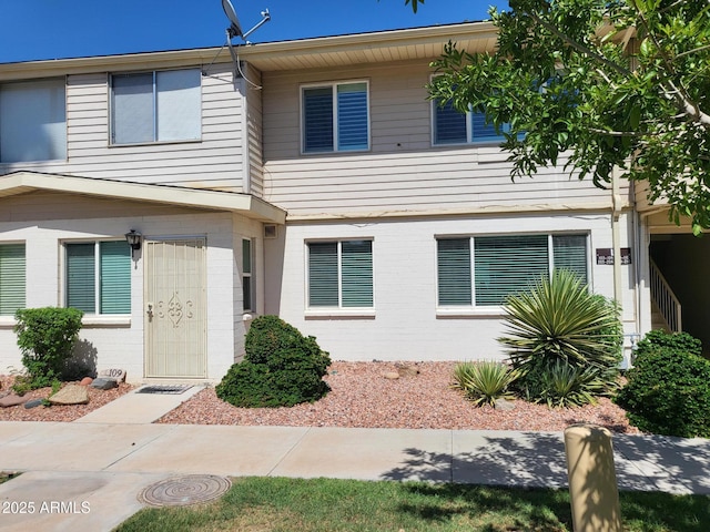 8221 E Garfield St Unit L109, Scottsdale, AZ 85257 - view of property with brick siding