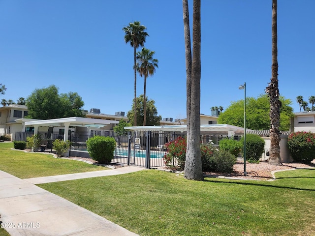 8221 E Garfield St Unit L109, Scottsdale, AZ 85257 - view of front of property featuring a community pool