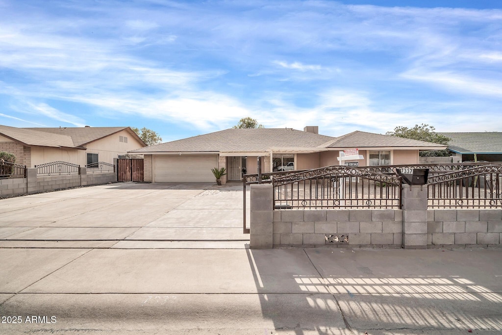 view of front of property featuring a garage