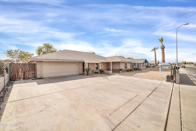 ranch-style home with a garage